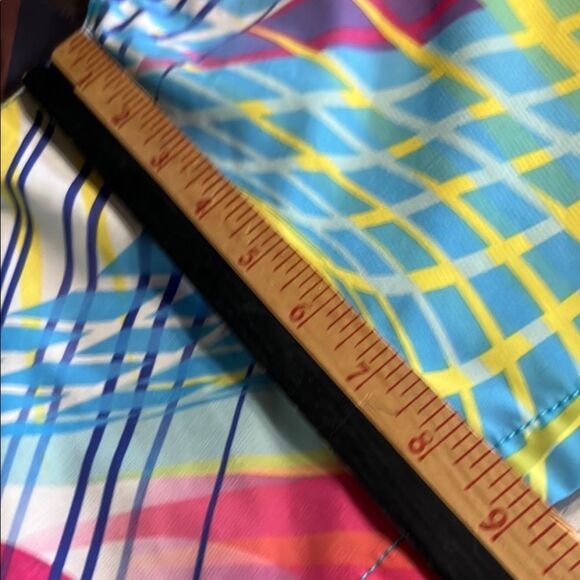 Tommy Bahama Blue and Yellow Board Shorts with Dynamic Patterns - Picture 8 of 12